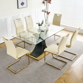 Modern style glass dining table with elegant transparent design, solid support base, pale yellow dining chair set with gold-plated legs, suitable for