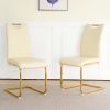 Modern style glass dining table with elegant transparent design, solid support base, pale yellow dining chair set with gold-plated legs, suitable for