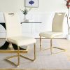 Modern style glass dining table with elegant transparent design, solid support base, pale yellow dining chair set with gold-plated legs, suitable for
