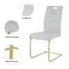 Modern style glass dining table, elegant transparent design, solid support base, grey dining chair set, gold-plated chair legs, suitable for restauran