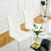 Modern simple table and chair set, one table and four chairs. Transparent tempered glass table top, solid base. Gold plated metal chair legs (set of 5