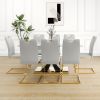 Modern style glass dining table, elegant transparent design, solid support base, grey dining chair set, gold-plated chair legs, suitable for restauran