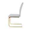 Modern style glass dining table, elegant transparent design, solid support base, grey dining chair set, gold-plated chair legs, suitable for restauran