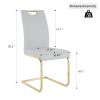 Modern style glass dining table, elegant transparent design, solid support base, grey dining chair set, gold-plated chair legs, suitable for restauran