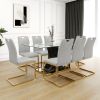 Modern style glass dining table, elegant transparent design, solid support base, grey dining chair set, gold-plated chair legs, suitable for restauran